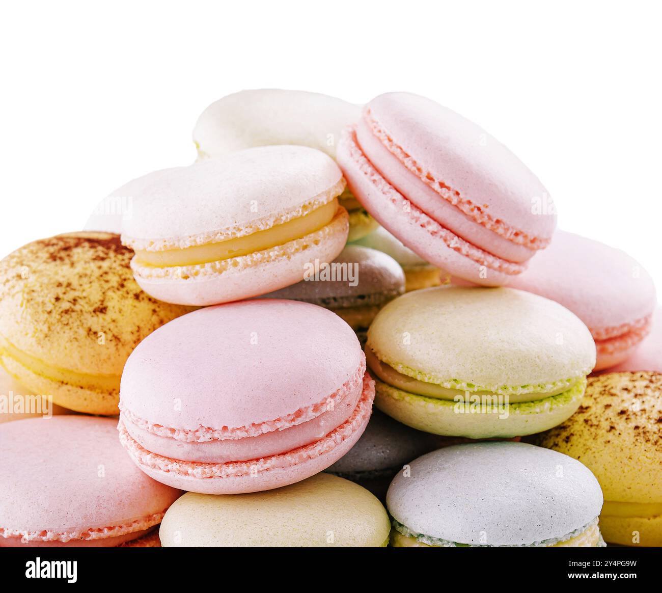 Multicolored macaroons on ceramic plate isolated on white Stock Photo