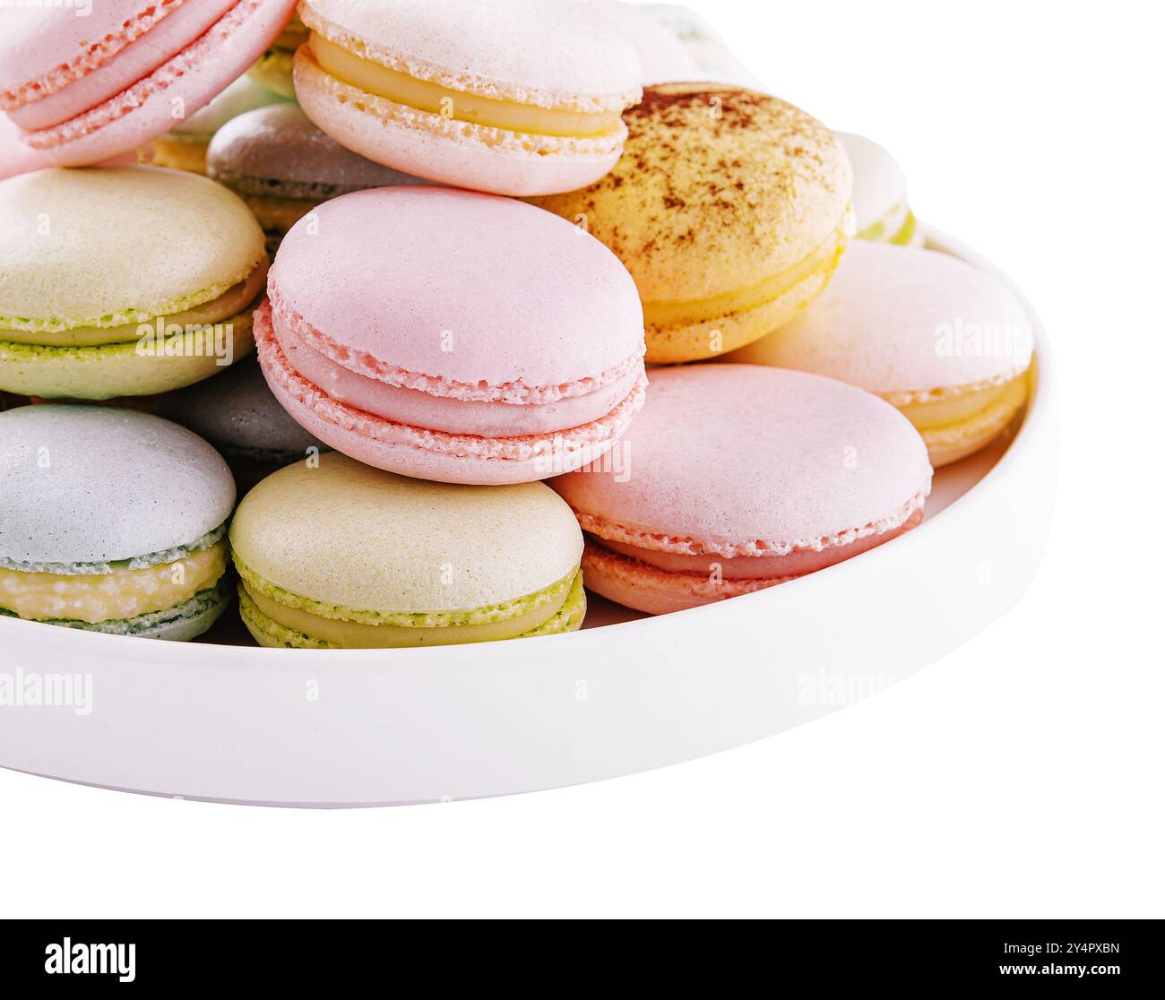 Multicolored macaroons on ceramic plate isolated on white Stock Photo