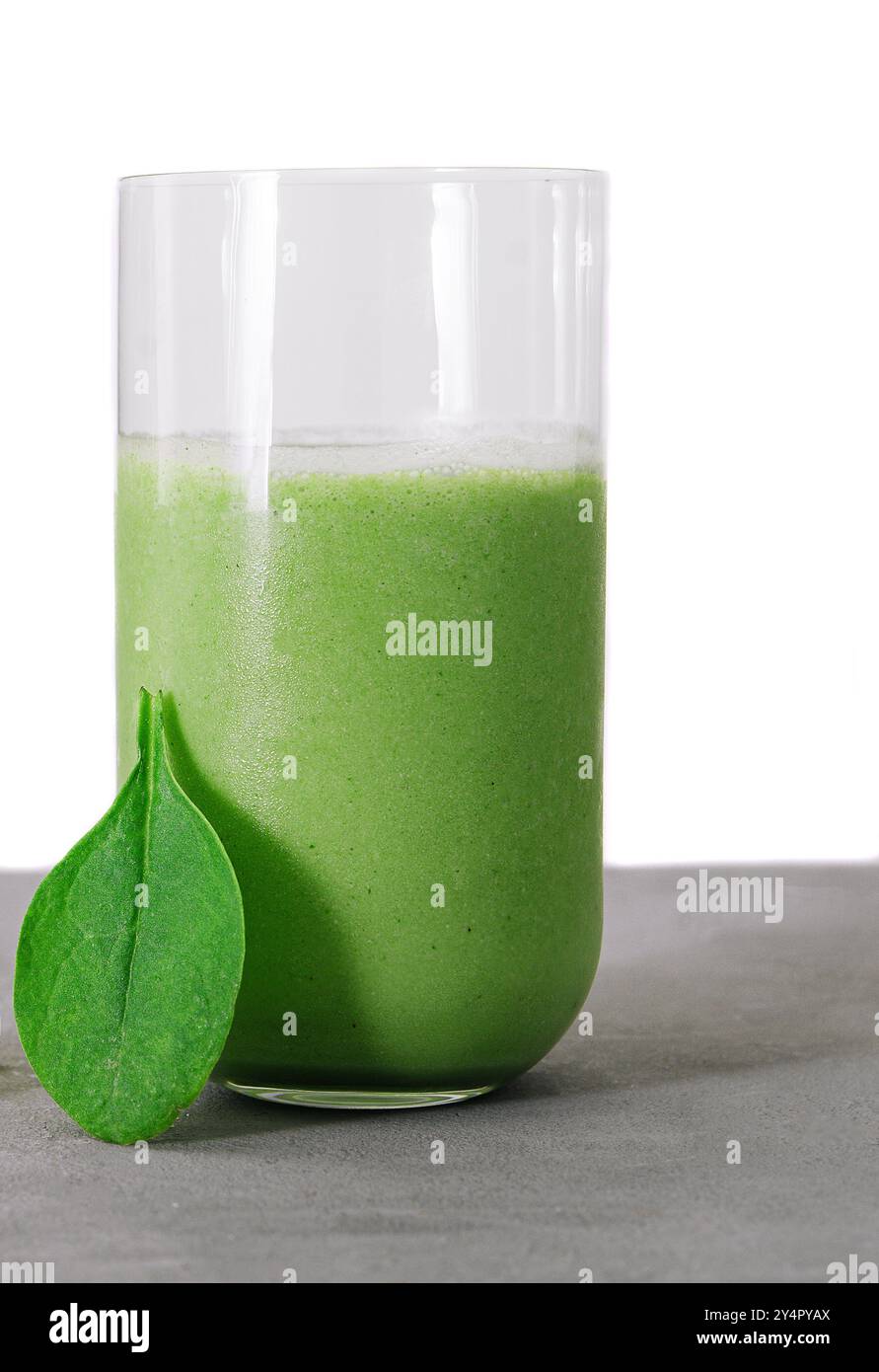 Glass of spinach detox juice with fruits Stock Photo - Alamy