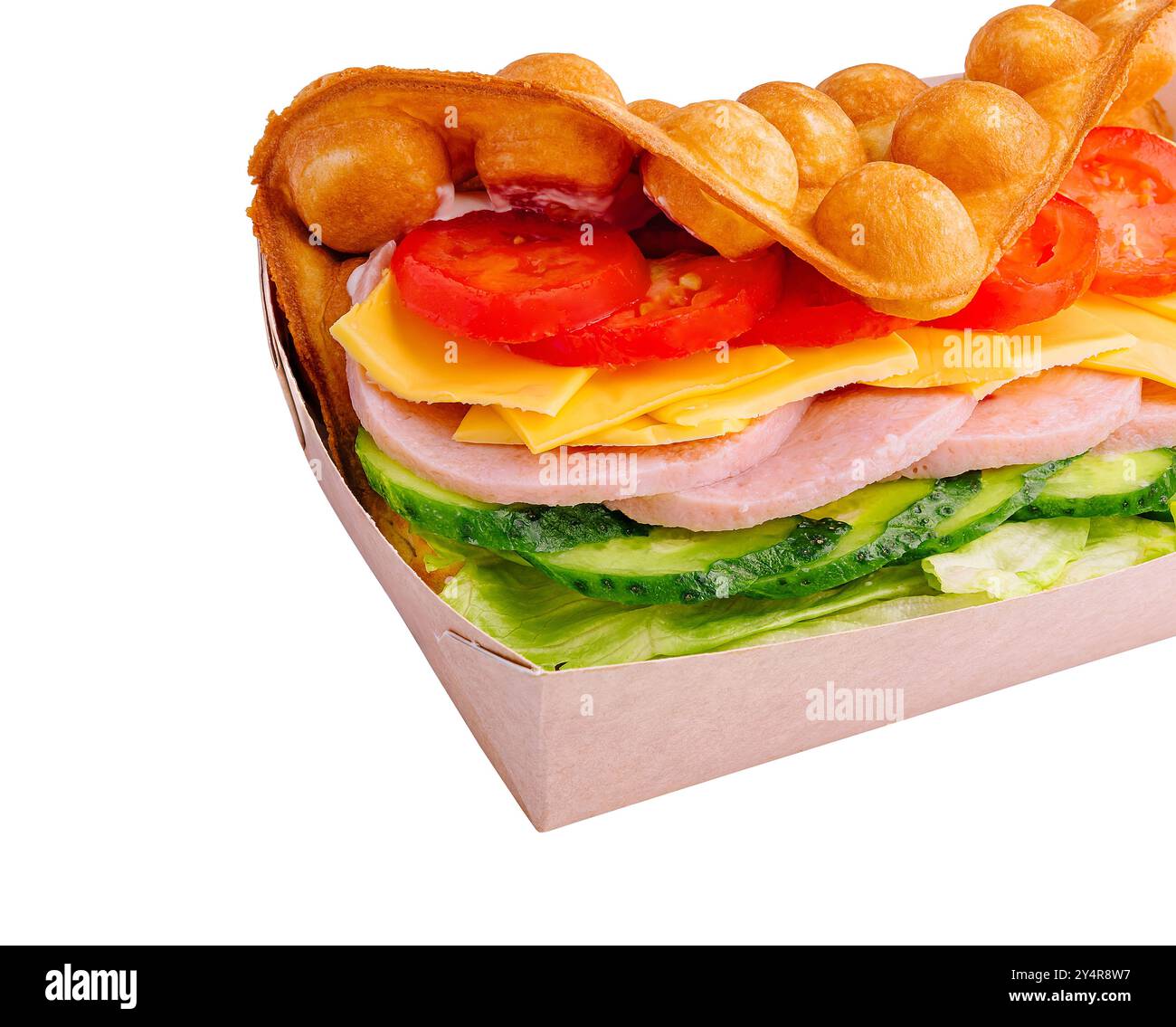 Belgian waffles with ham, cheese and salad on box Stock Photo