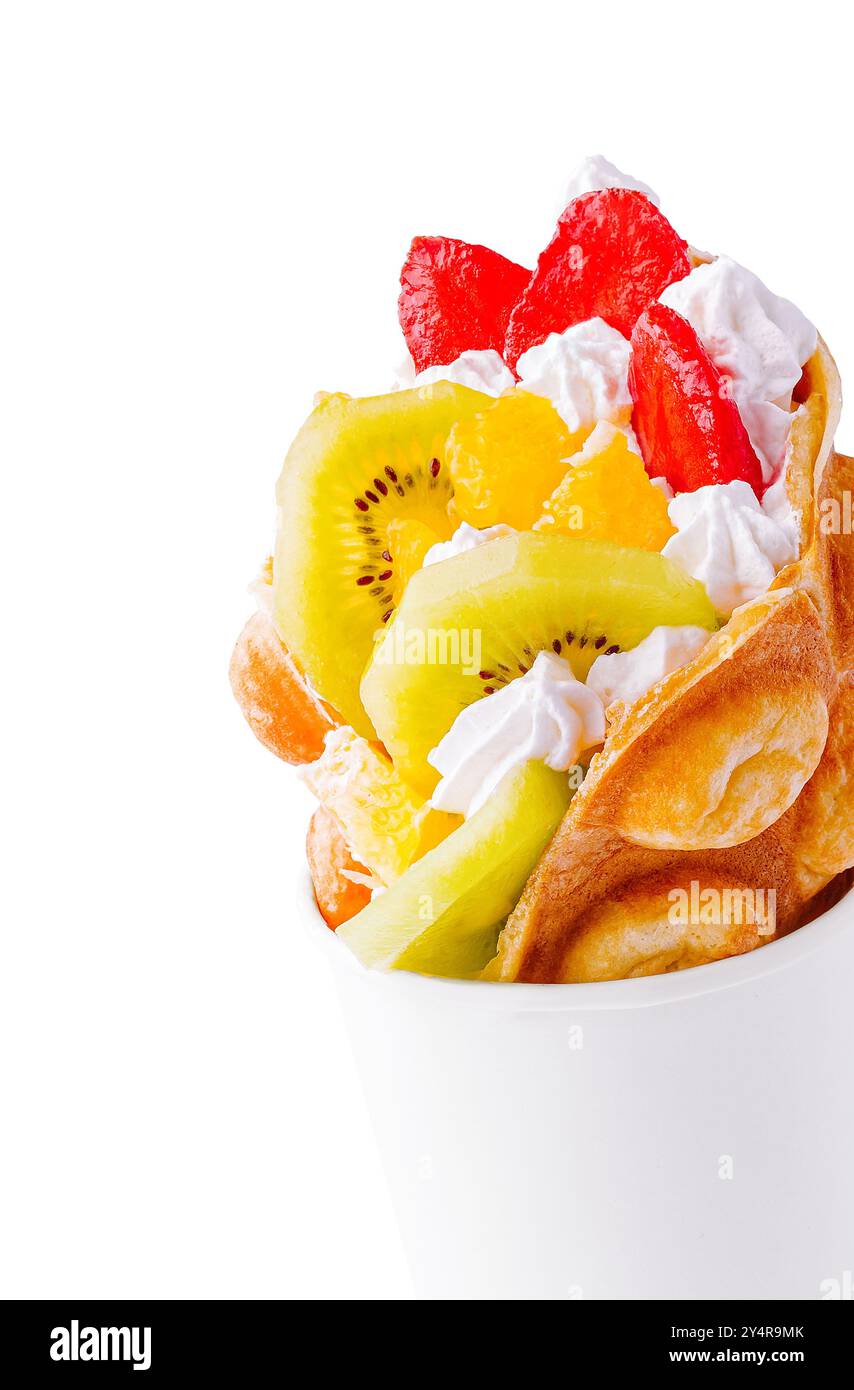 Bubble Waffle with kiwi, and whipped cream strawberry Stock Photo - Alamy