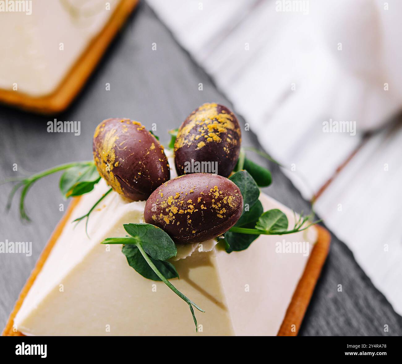 dessert souffle cookies with chocolate Easter eggs Stock Photo