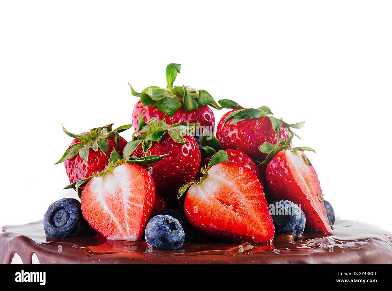 cake with melted dark chocolate with fresh berries Stock Photo