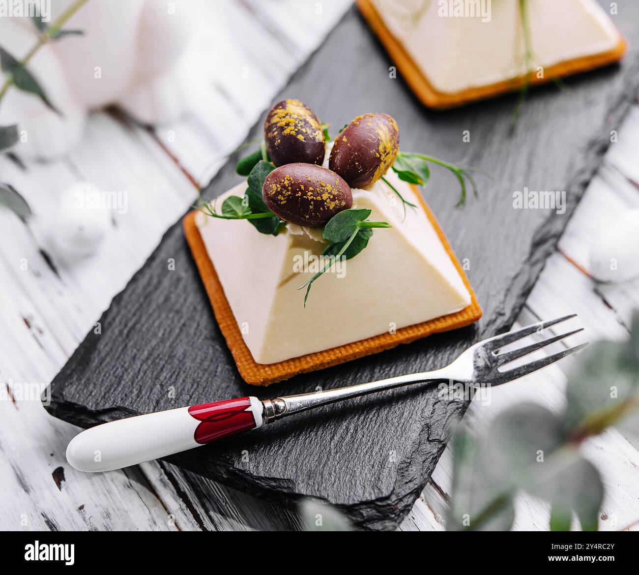 dessert souffle cookies with chocolate Easter eggs Stock Photo