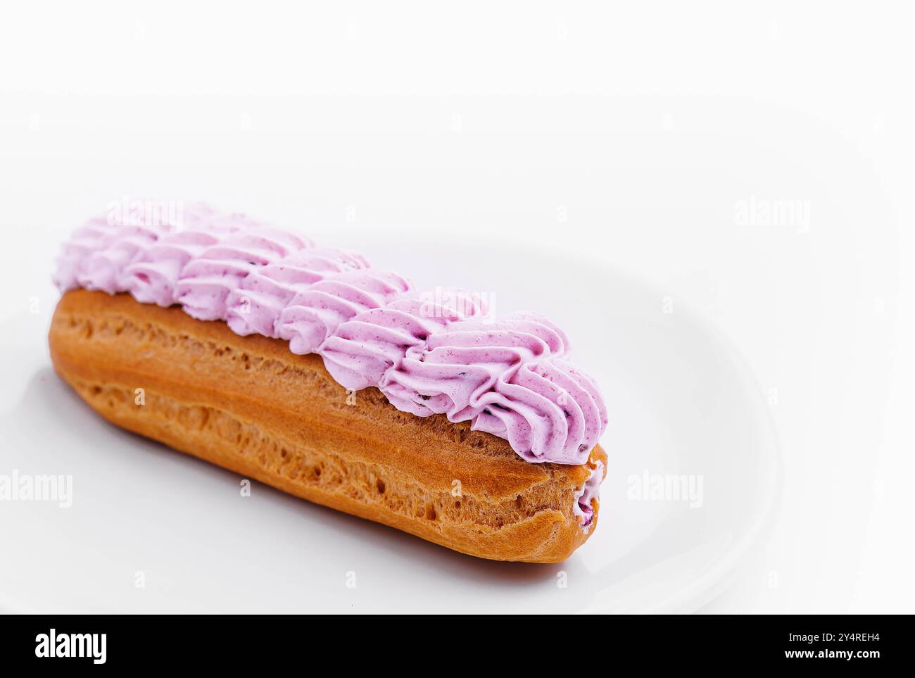 Fresh tasty eclairs isoalted on white background Stock Photo
