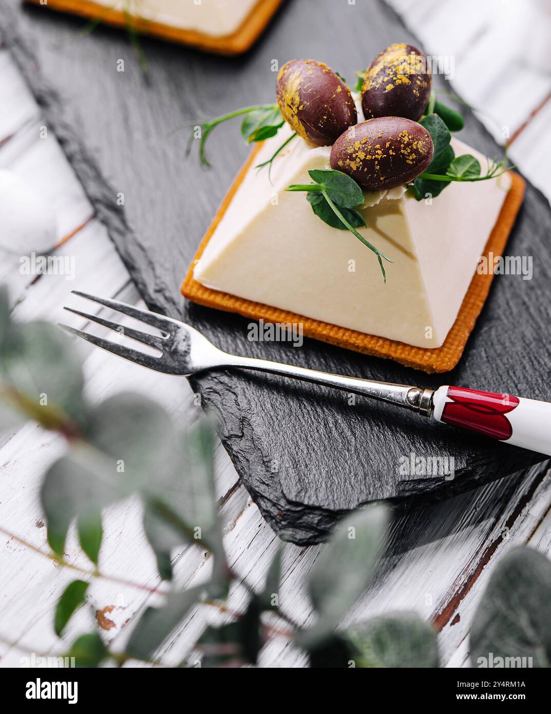 dessert souffle cookies with chocolate Easter eggs Stock Photo