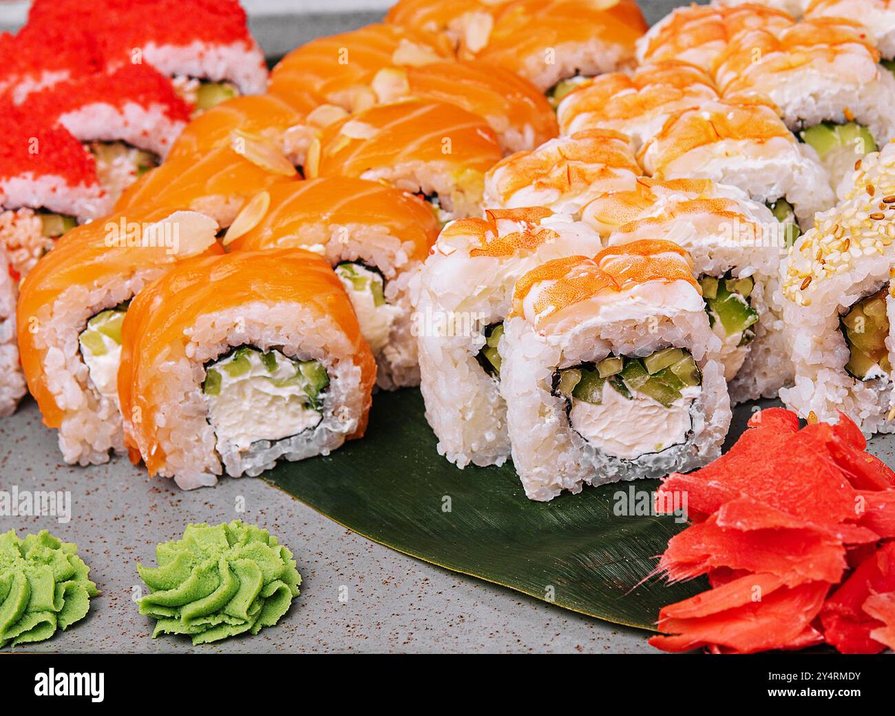 Four different types of sushi rolles Stock Photo - Alamy
