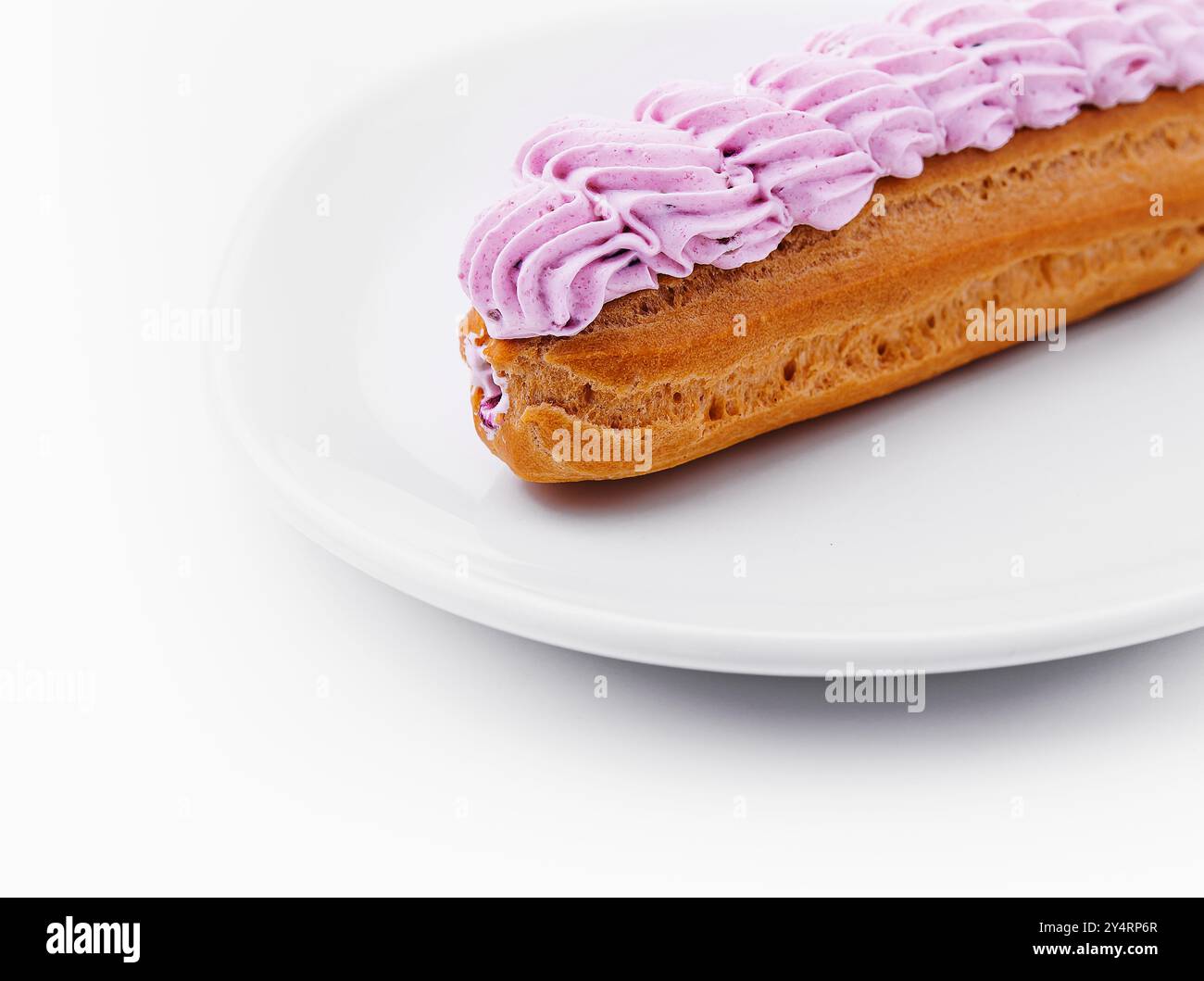 Fresh tasty eclairs isoalted on white background Stock Photo