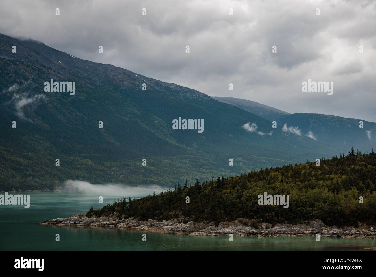 Mountains bordering the water in Skagway, Alaska. Stock Photo