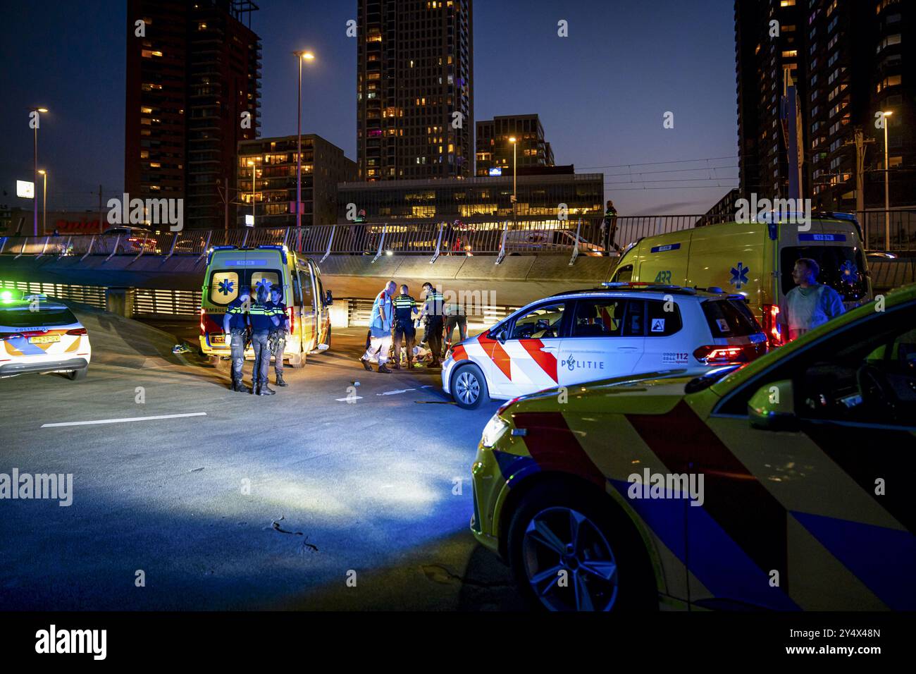 ROTTERDAM - Emergency workers at a stabbing incident in which one ...