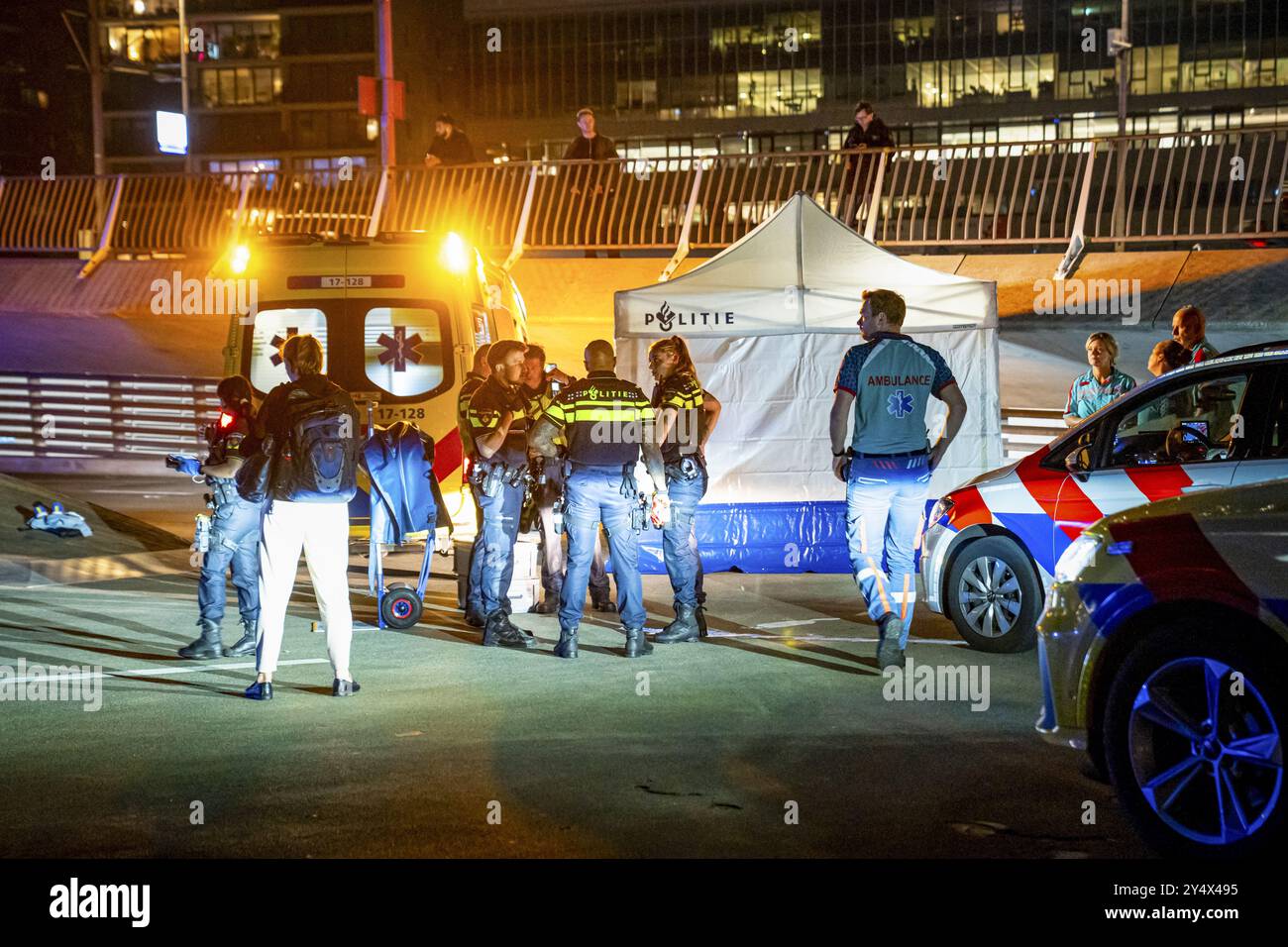 ROTTERDAM - Emergency workers at a stabbing incident in which one ...
