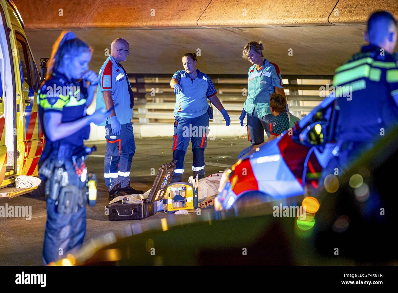 ROTTERDAM - Emergency workers at a stabbing incident in which one ...