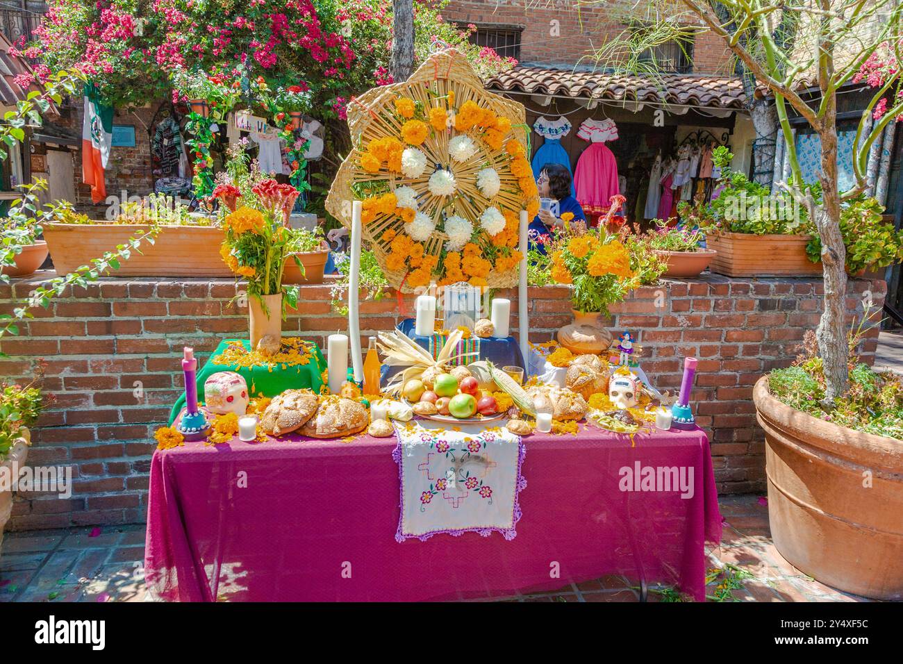 Los Angeles, USA - July 5, 2008: The Olivero street is still typical mexican and the place is also called old pueblo. People decorate altar with flowe Stock Photo