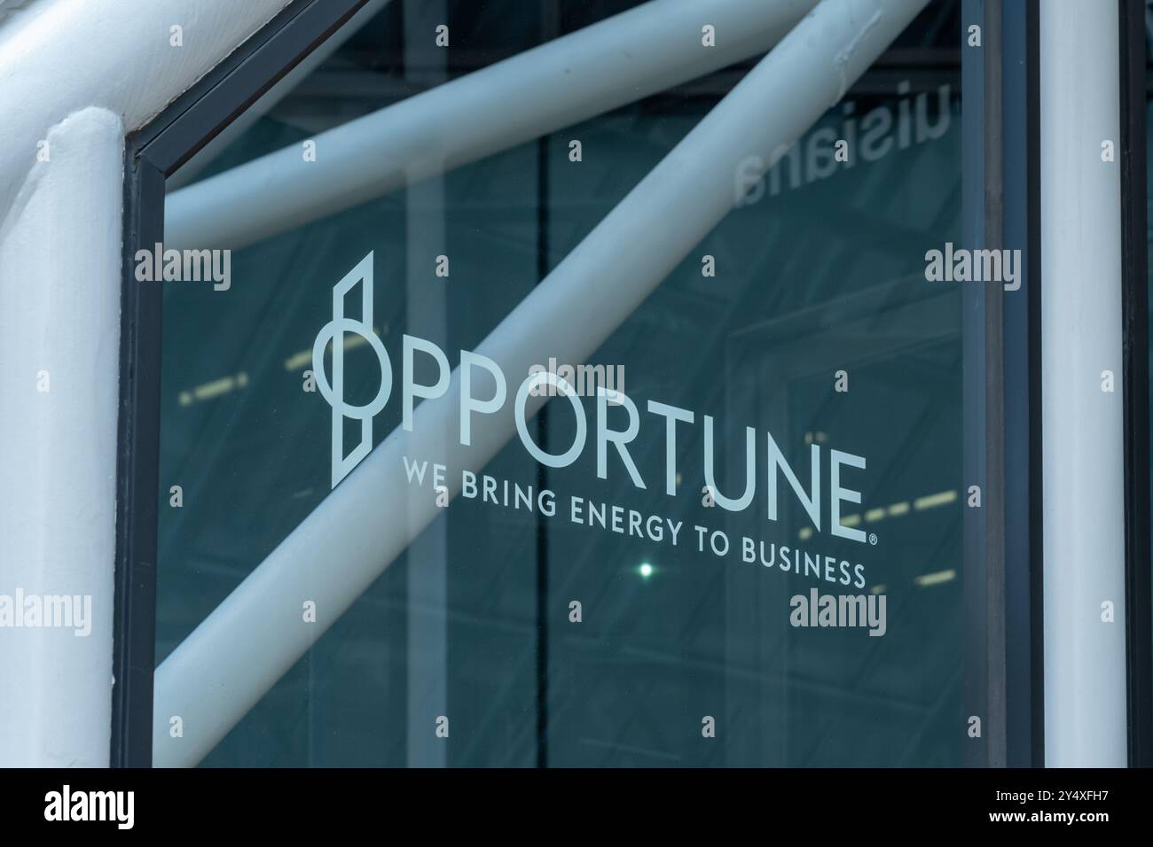Opportune company logo sign on the building in Houston, TX, USA. Stock Photo