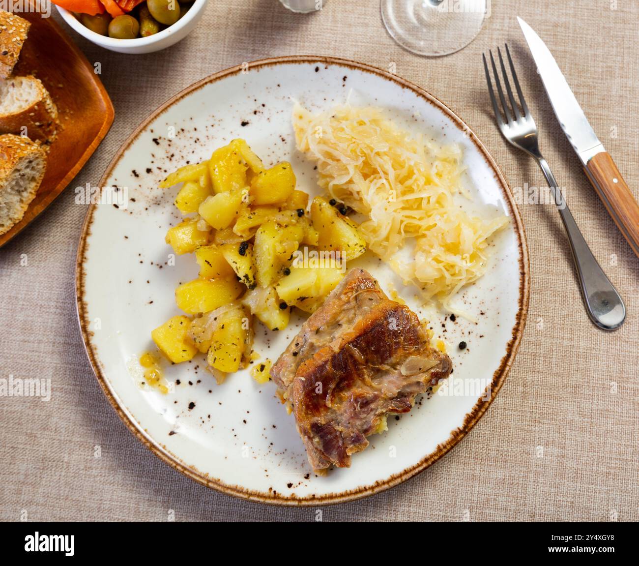 pork-served-with-pickled-cabbage-and-potatoes-stock-photo-alamy
