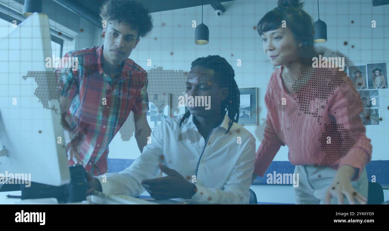 World map and data points image over diverse team collaborating in office Stock Photo