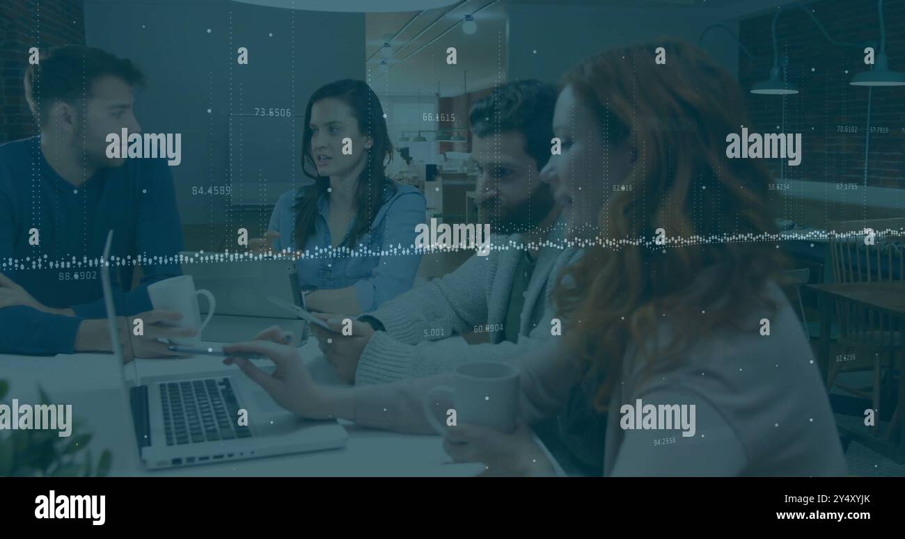Financial data processing image over diverse business people working on laptops Stock Photo