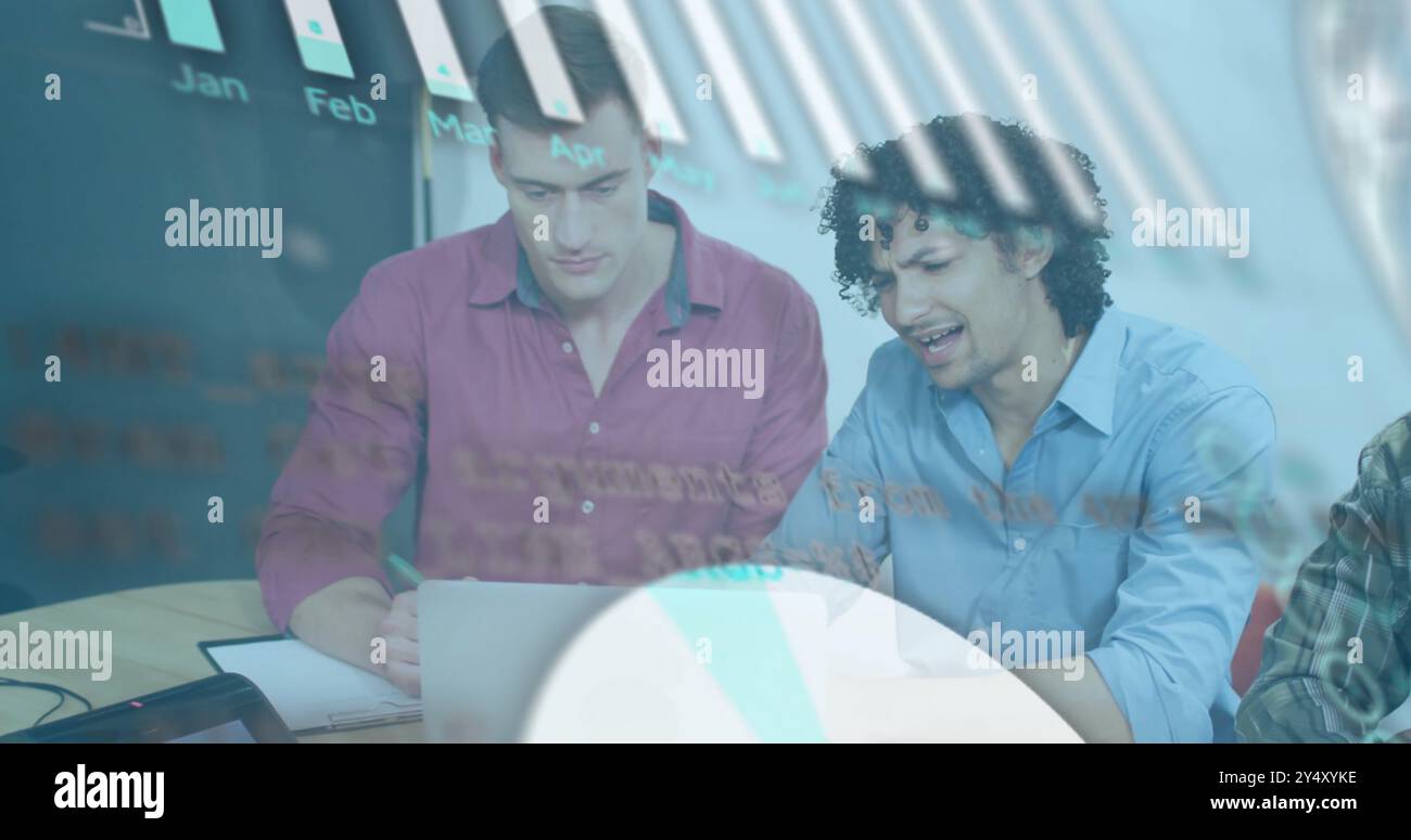 Business data graph image over two men working on laptop in office Stock Photo