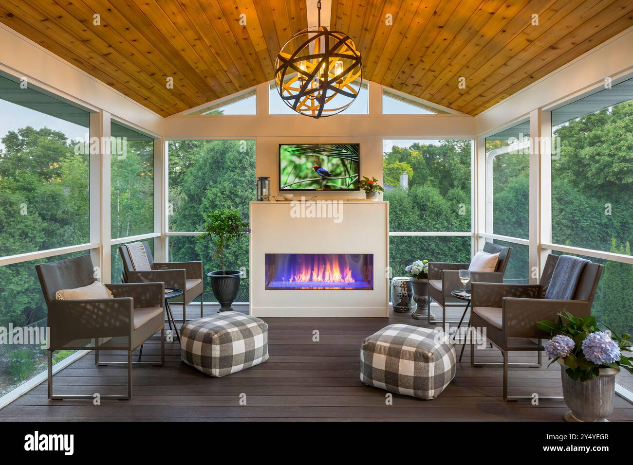 Second floor screened 3 season porch with fireplace stock photo alamy