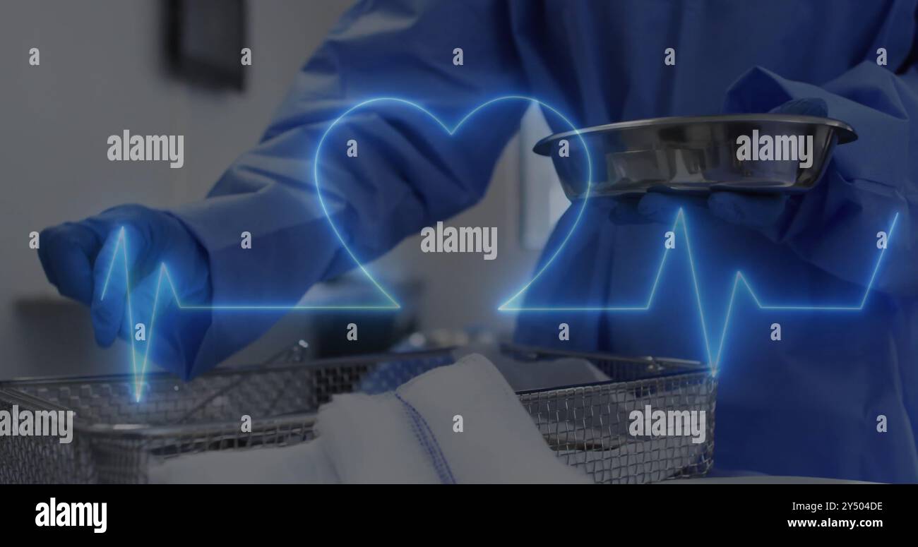 Medical professional handling instruments, heart rate image over ...