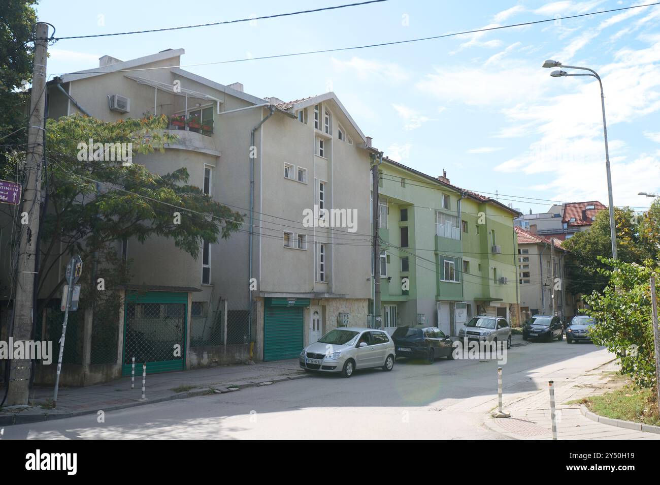 Residential street showcasing diverse architectural styles in a quiet ...