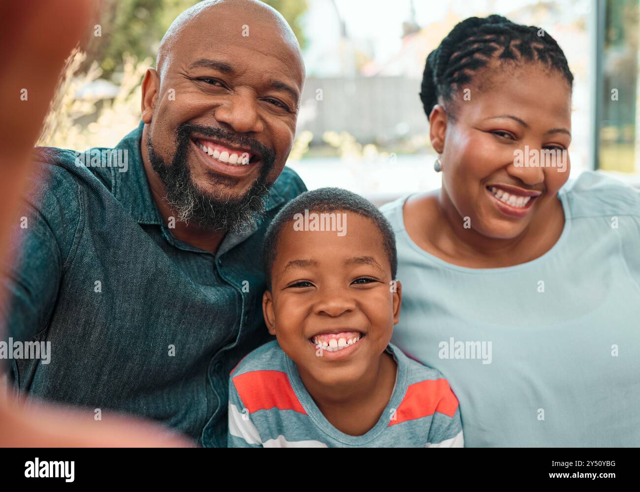 Black family, hand and selfie in home, portrait and child