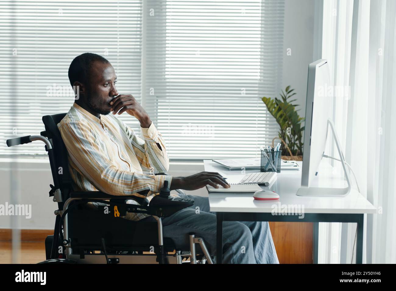 Businessman Working On Computer In Office Stock Photo