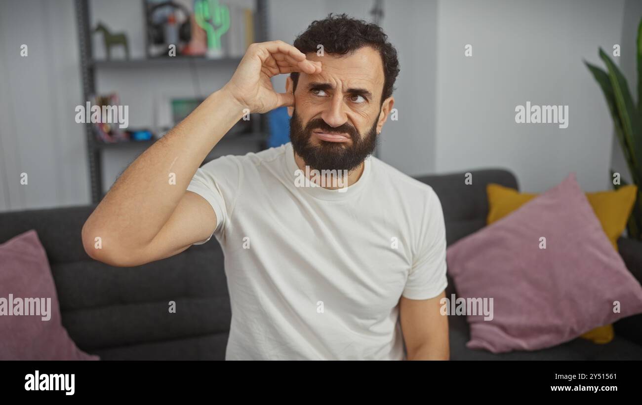 Confused curious man sitting hi-res stock photography and images - Alamy