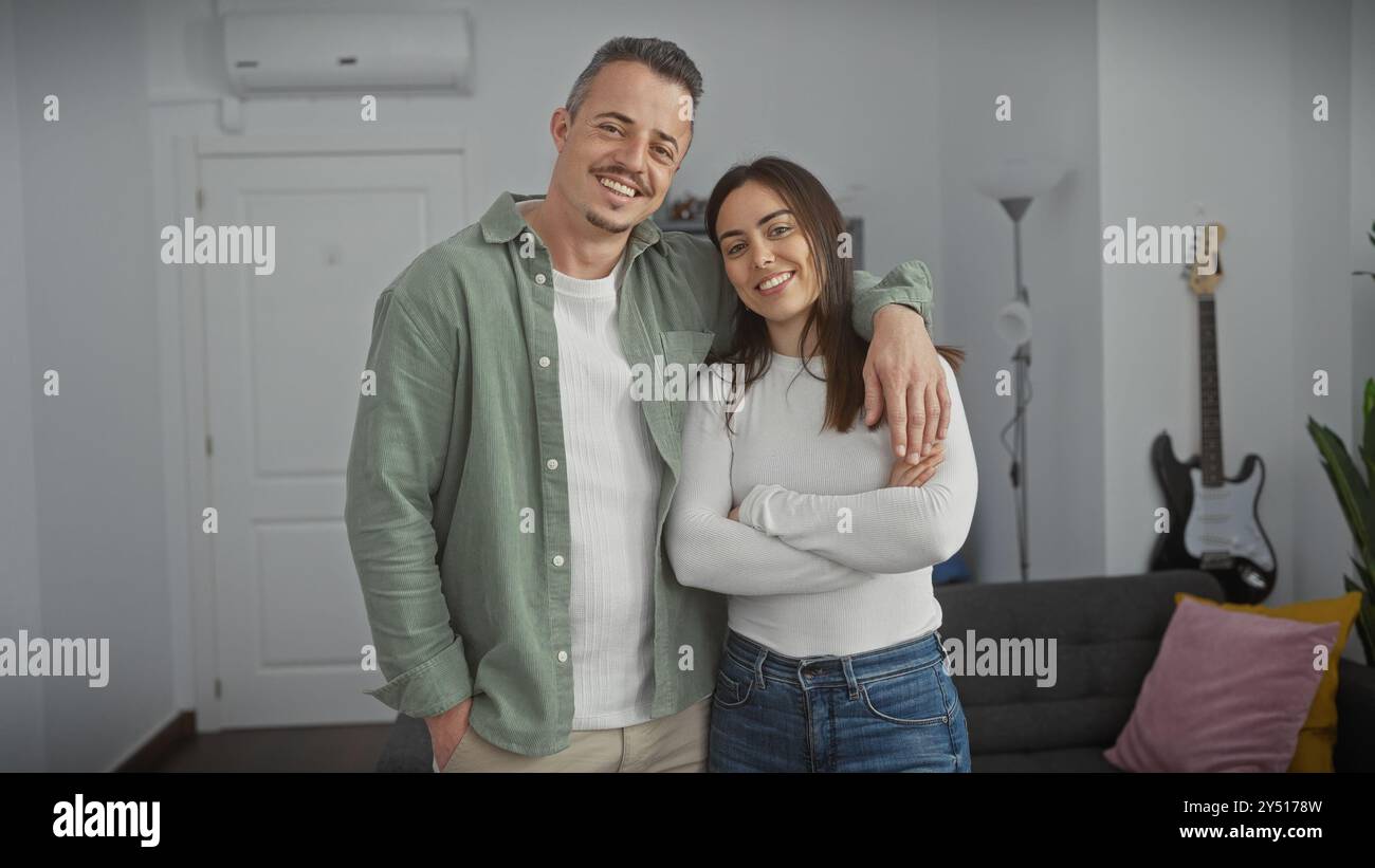 Picture of A loving couple embraces in their modern living room with stylish decor ...