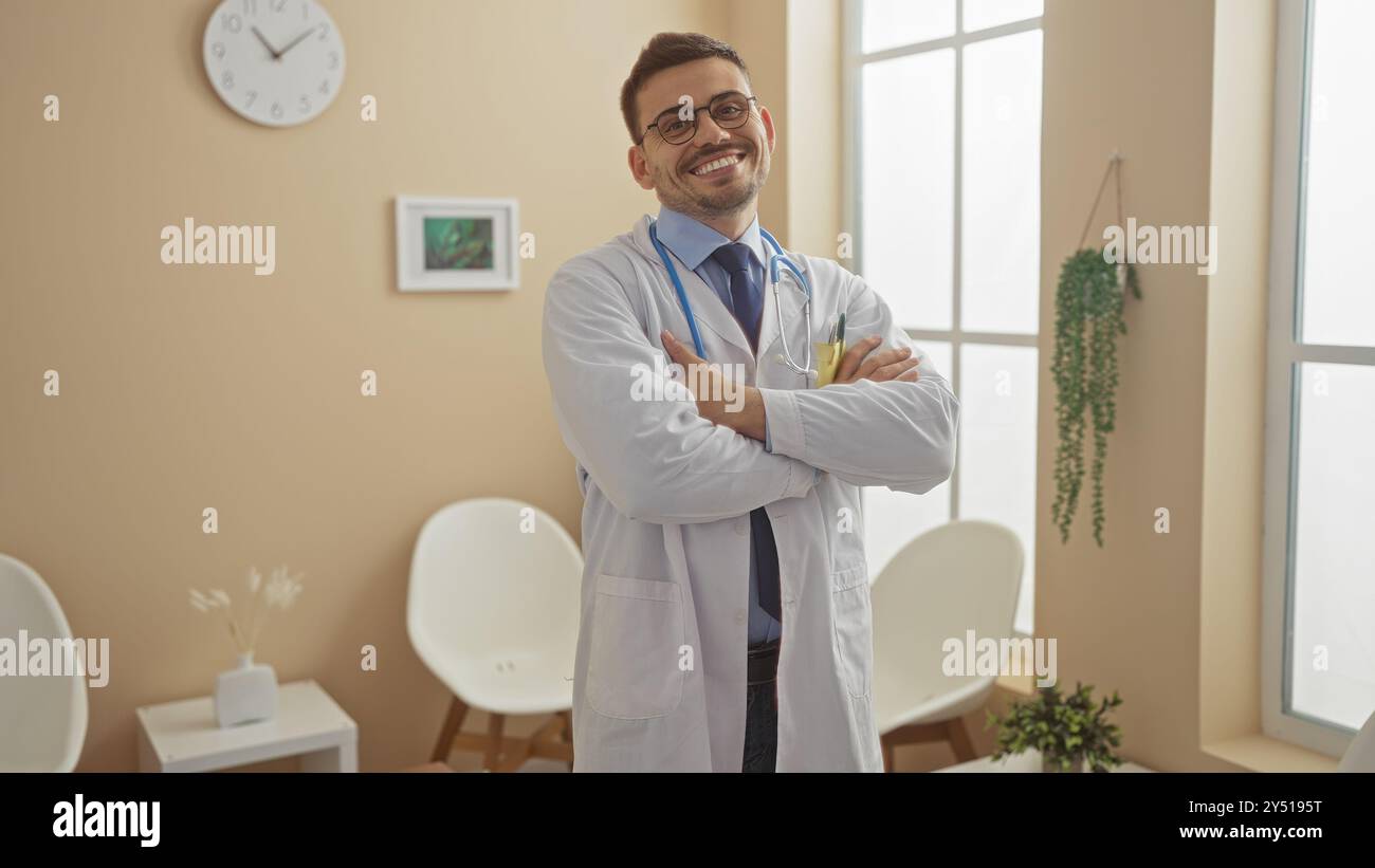 Handsome young hispanic male doctor with a beard, wearing glasses and a ...