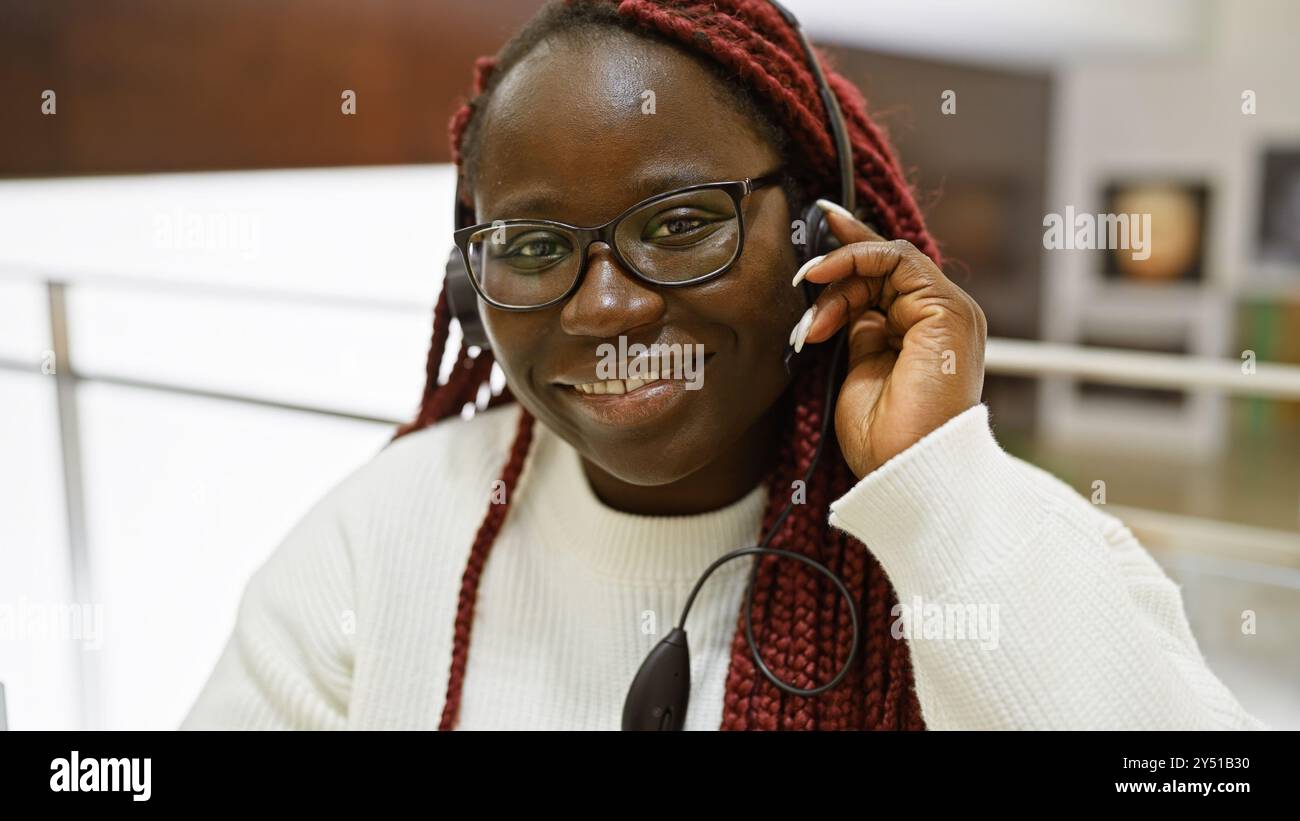 Woman wearing glasses braids hi-res stock photography and images - Alamy