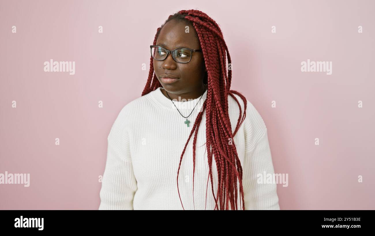 African american woman with braids wearing glasses, isolated over a ...