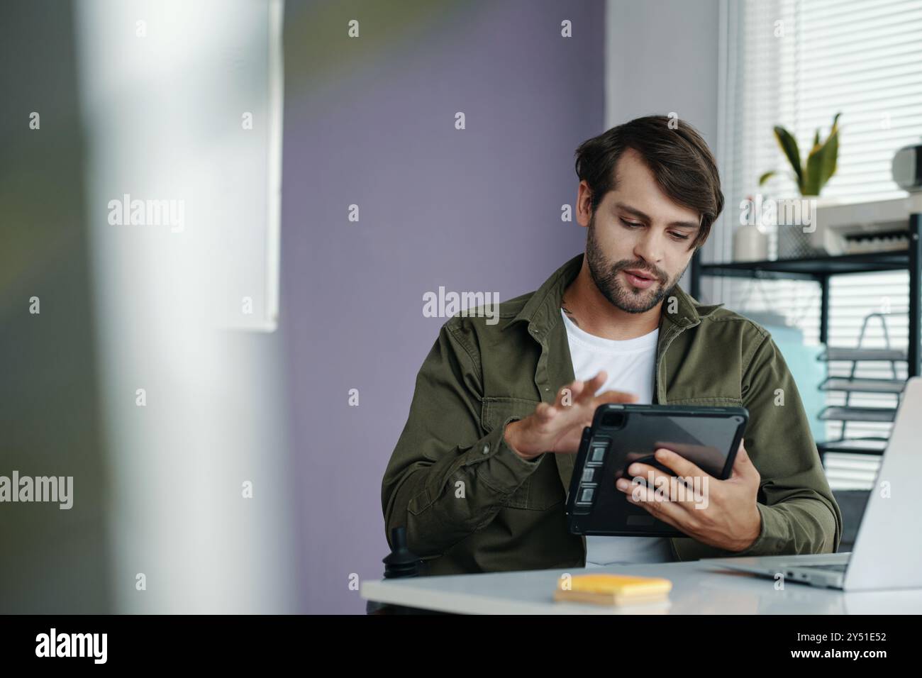 Manager Working Online On Tablet PC Stock Photo