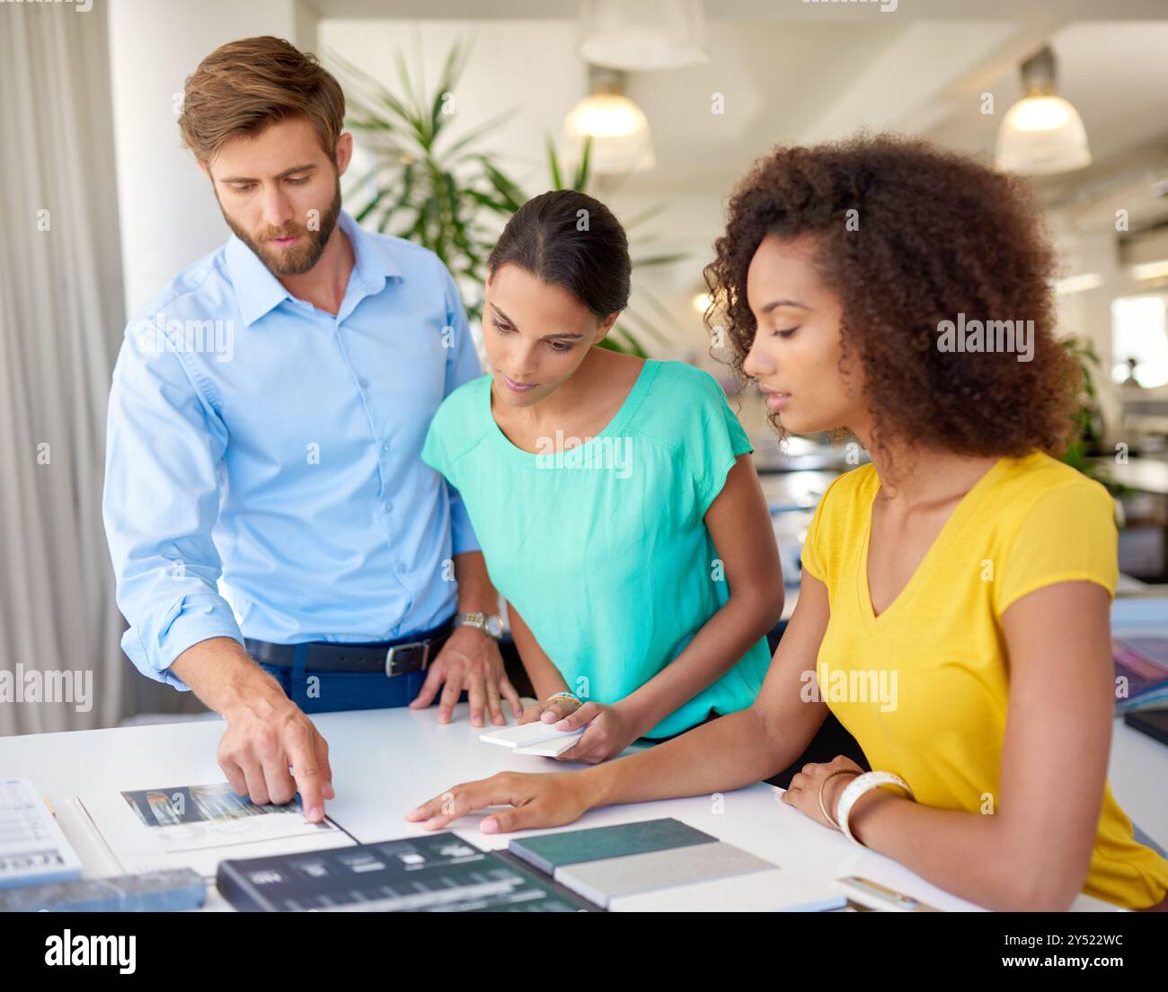 Office, interior design and business people with sample for planning ...