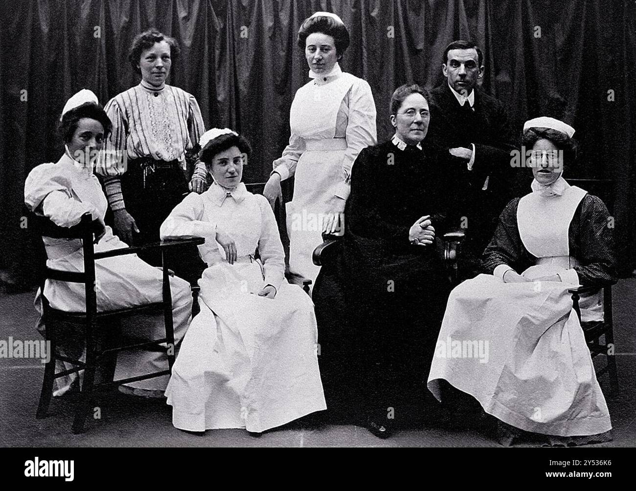 Senior nursing staff posing together at General Lying In Hospital, York Road, Lambeth in 1908, reflecting early 20th-century hospital life Stock Photo