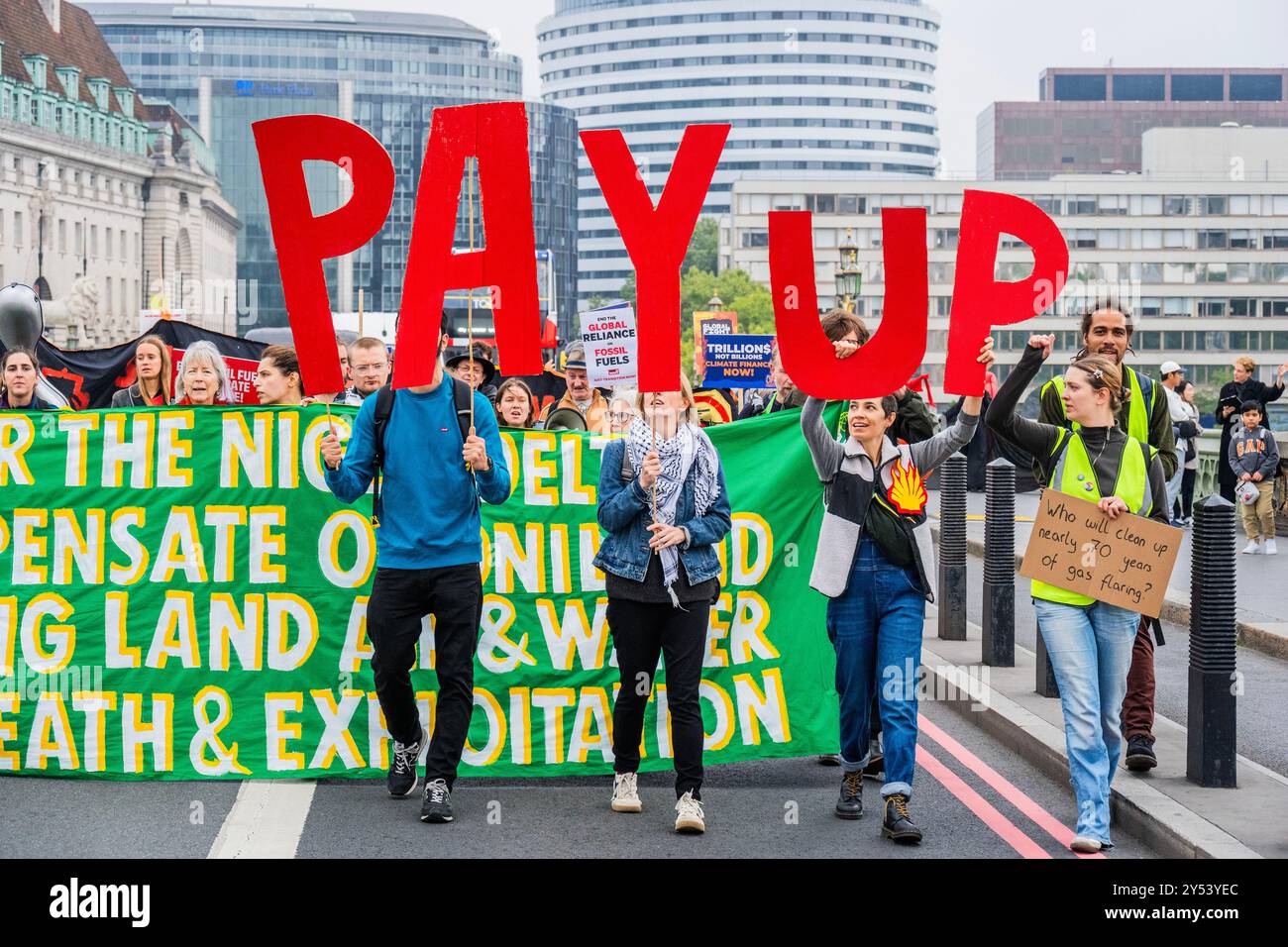 London, UK. 20 Sep 2024. Phase Out, Pay Up, Justice Now! A protest by the Climate Justice Coalition and War on want - They believe ‘Shell are responsible for driving climate change and silencing those who dare to speak out - not least in the Niger Delta. And are demanding that Shell PayUp for the damage they have caused and that Parliament commits to paying climate finance and an end to fossil fuels exploitation.' The coalition believes ‘The world has no more time to phase-out of fossil fuels and that the Global North is failing in delivering their climate finance obligations to the Global Sou Stock Photo