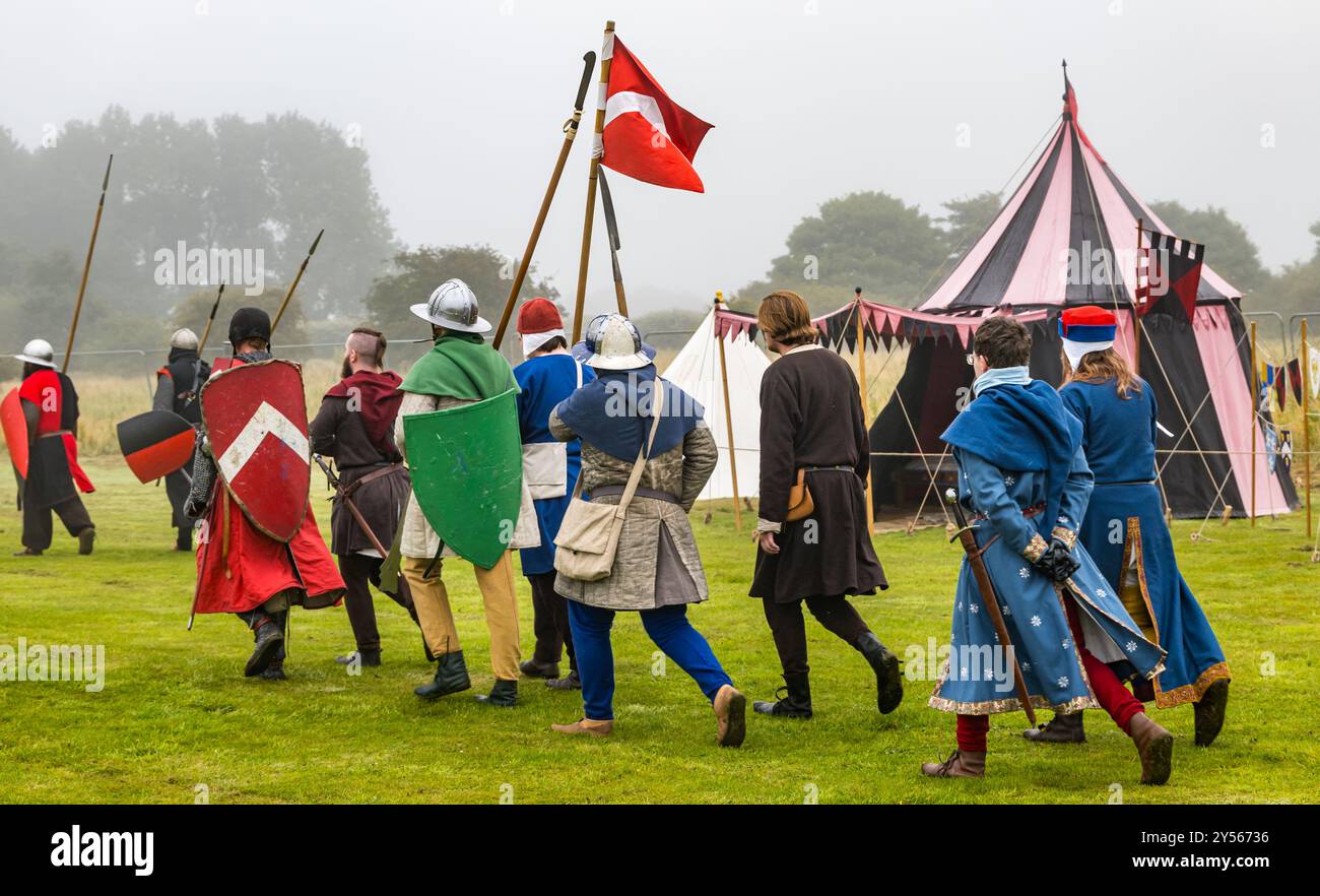 Re-enactors in Medieval costume march at reenactment of Siege of ...