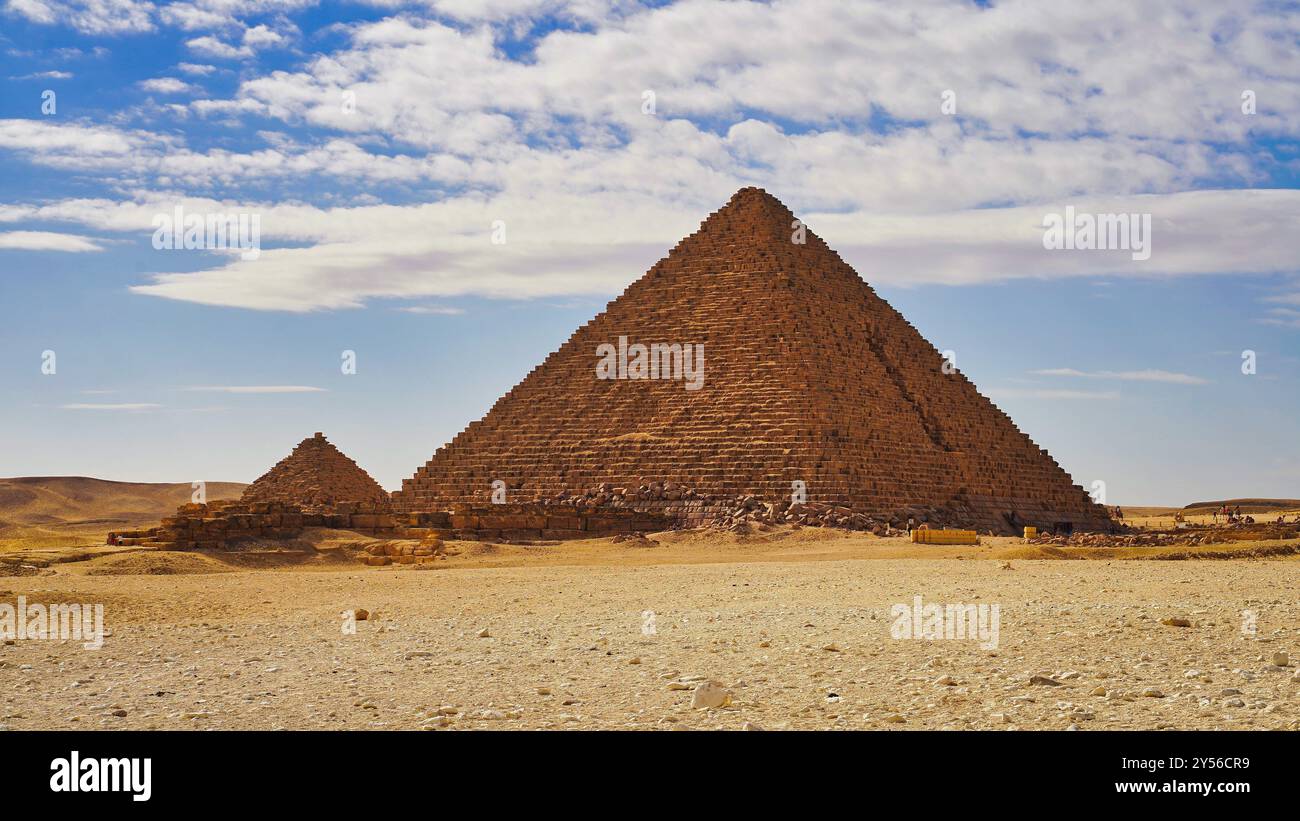 Pyramid of Menkaure, the last of the 4th dynasty great pharoahs and its satellite pyramid built around 2500 BC on the Giza plateau Stock Photo