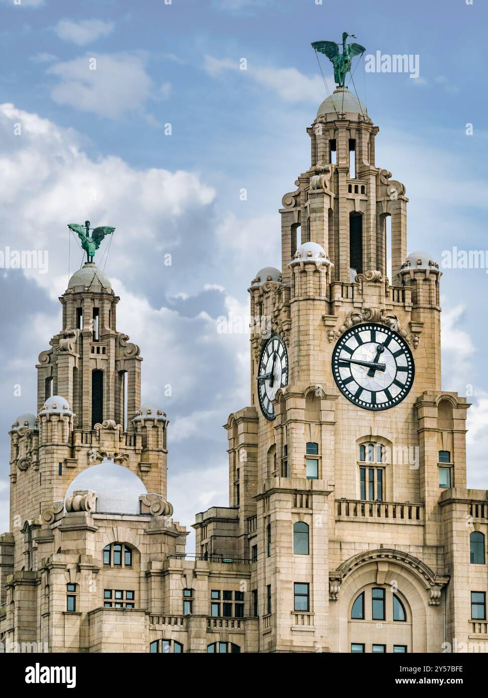 Close up view of clock towers of Royal Liver building with cormorant Liver Birds and UK's largest clocks, Pier Head, Liverpool, England, UK Stock Photo