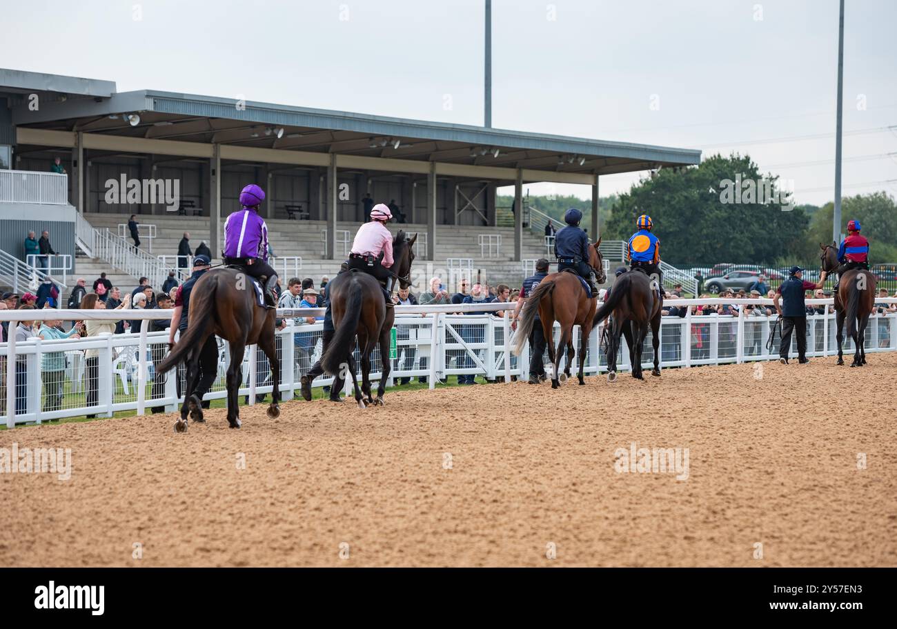 Southwell, United Kingdom, Friday 20th September 2024; the horses and jockeys head onto the track at Southwell Racecourse, ahead of the public gallop of City Of Troy at the track in preparation for a crack at the 2024 Breeders' Cup Classic. Credit JTW Equine Images / Alamy Stock Photo