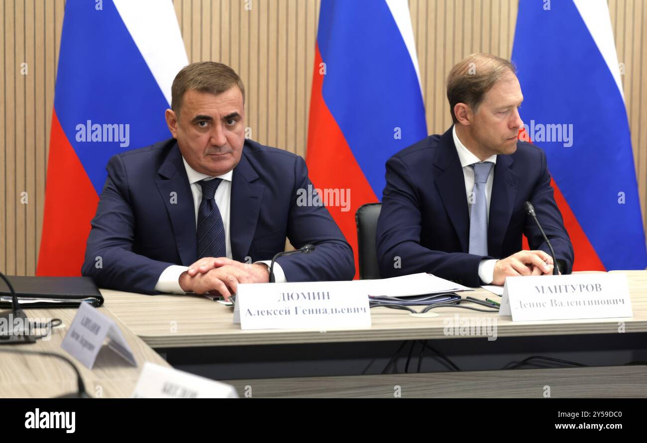 St Petersburg, Russia. 19th Sep, 2024. Russian First Deputy Prime Minister Denis Manturov, right, and Presidential Aide and State Council Secretary Alexei Dyumin, left, before the start of a meeting of the Military-Industrial Commission on Special Purpose UAV's at the Special Technology Centre, September 19, 2024 in Strelna, St Petersburg, Russia. Credit: Gavriil Grigorov/Kremlin Pool/17�Թ����� Live News Stock Photo