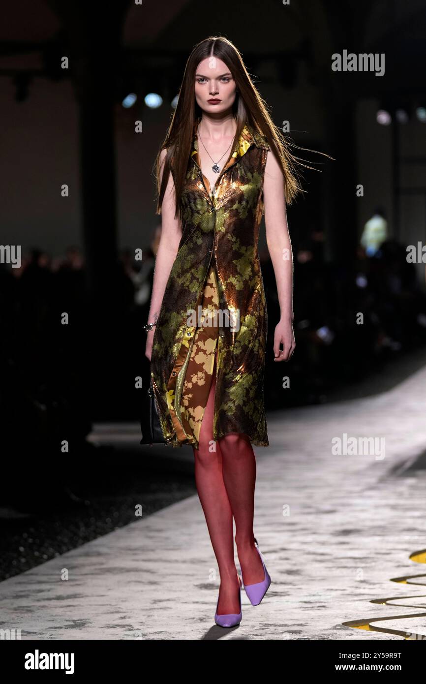 A model wears a creation as part of the Versace Spring Summer 2025 ...
