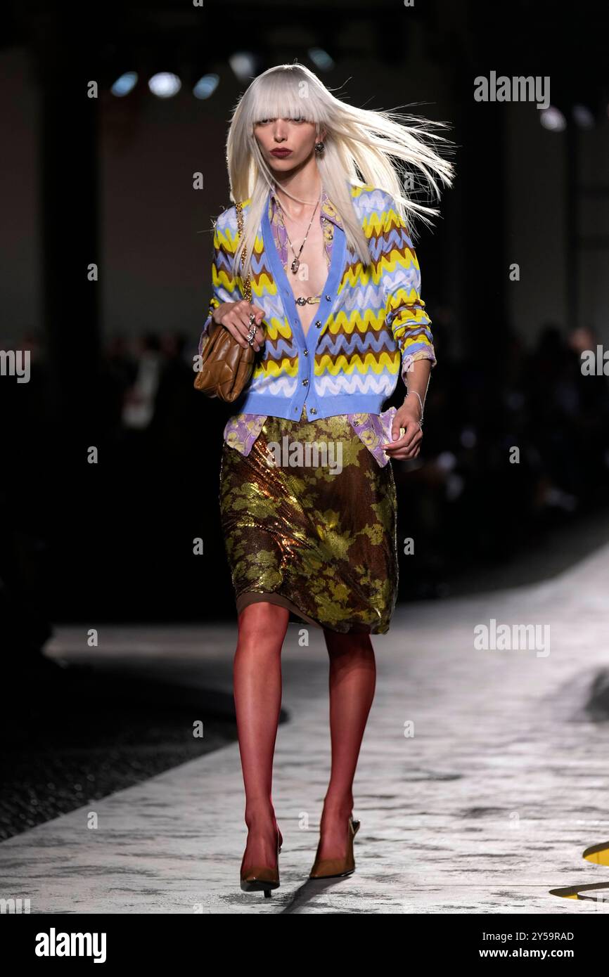 A model wears a creation as part of the Versace Spring Summer 2025 ...