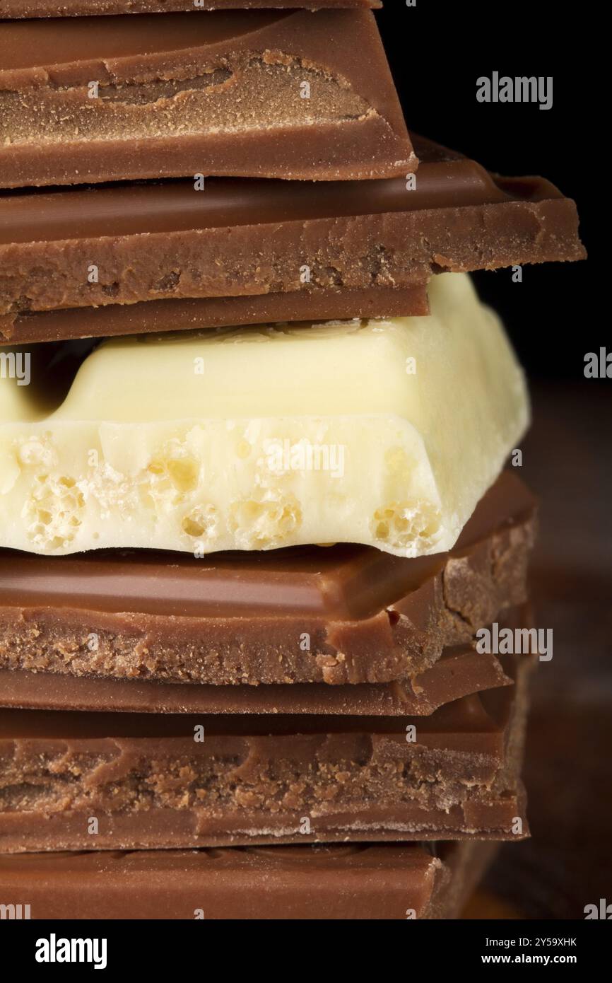 Chocolate stack of dark and white chocolate Stock Photo - Alamy