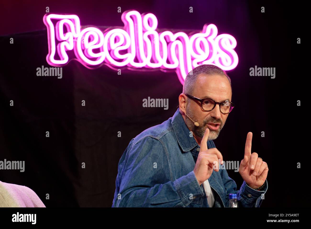 Cologne, Germany. 20th Sep, 2024. Comedian Kurt Krömer sits on stage at