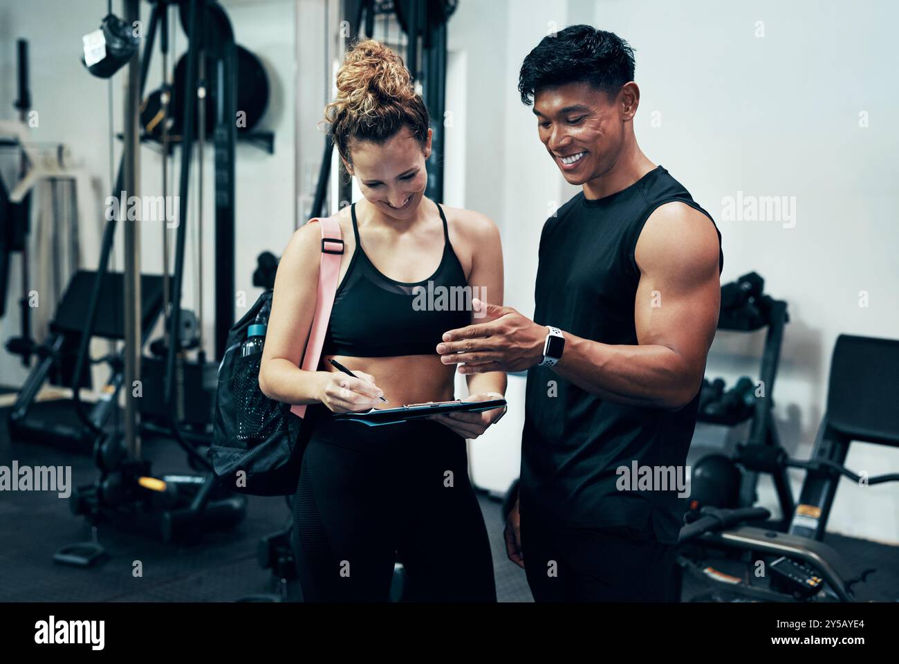Clipboard, gym or sign up with man and woman together for exercise or ...