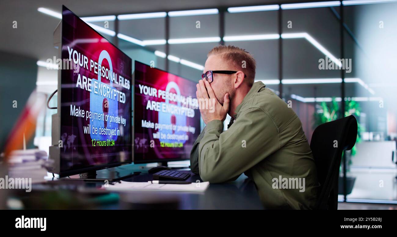 Ransomware Malware Cyber Attack On Business Computer Stock Photo