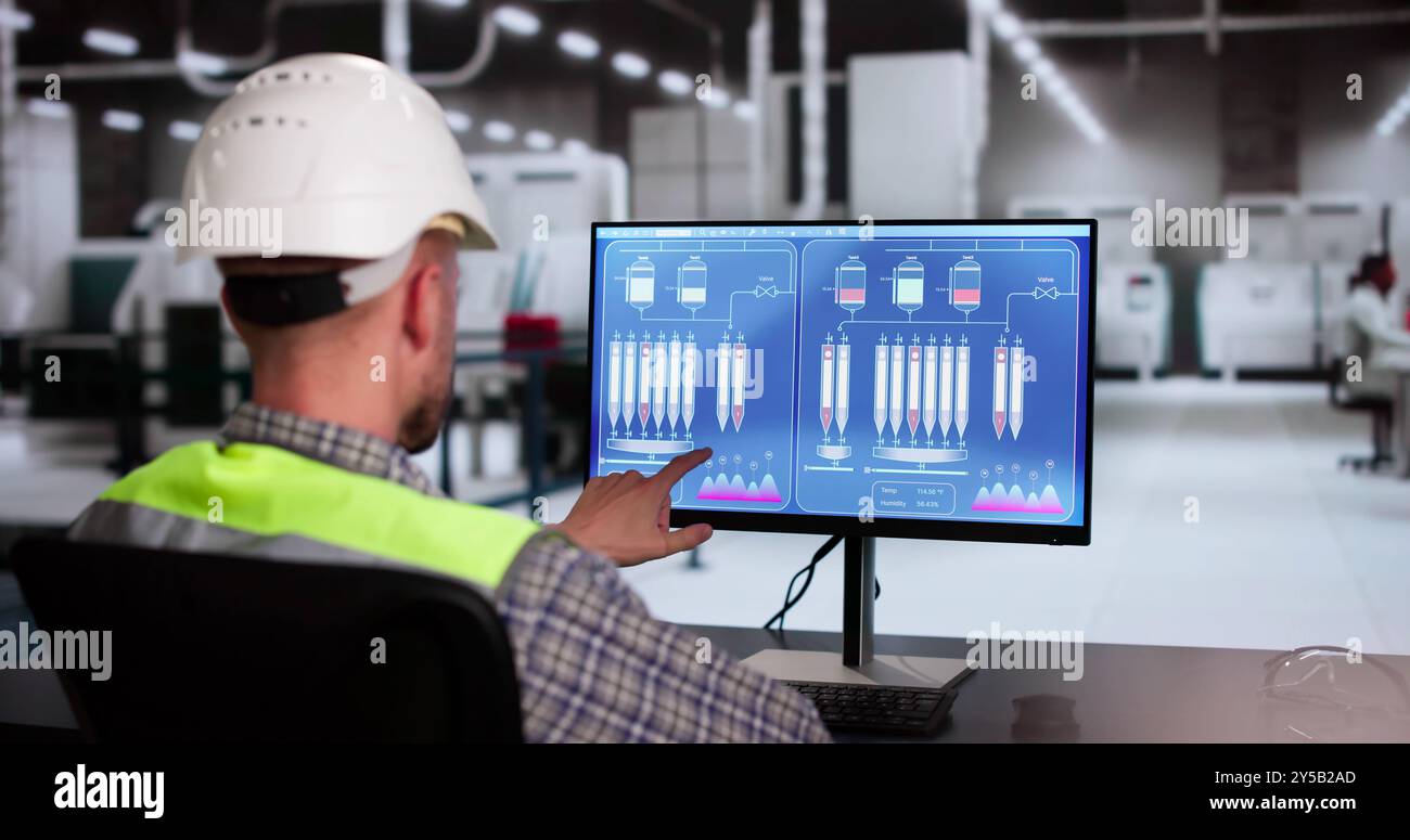 Operator And Engineer Monitor SCADA System Using Control Stock Photo ...