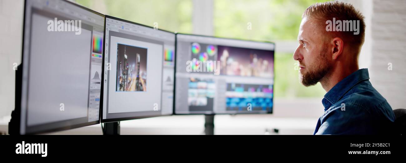 Graphic Web Designer Using Design Editing Software Stock Photo