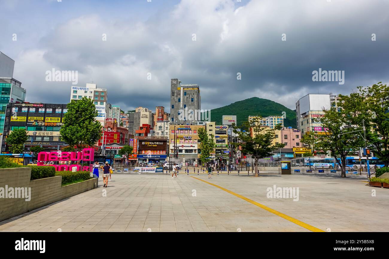 Busan, South Korea - August 27, 2024 - street view of Buildings and Busan letter sign next to Busan Station Stock Photo